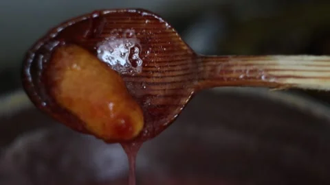 Stirring Strawberry Jam while Cooking (50 fps) Stock Footage 233471869