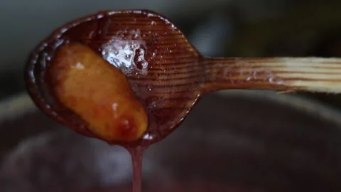Stirring Strawberry Jam while Cooking (Slow-Motion) Stock Footage 233471981