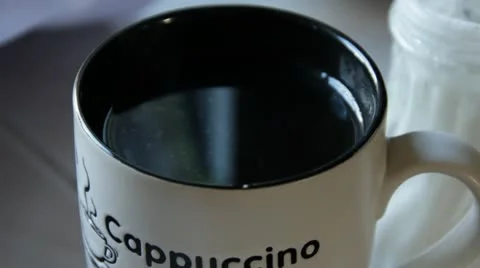 Stirring Sugar in Coffee Extreme Close Up.mp4 스톡 동영상 10748829