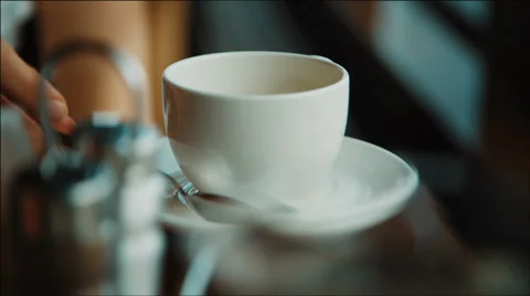 Stirring tea in white Teacup Stock Footage 36091306