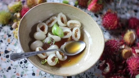 Stirring tropical fruit Stock Footage 203769954