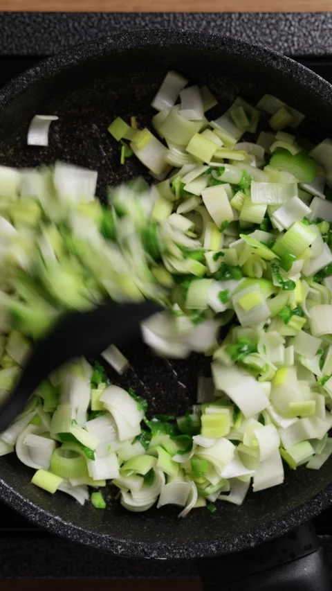 Stirring Vegetables In Pan Top View Vertical Stock Footage 337190960