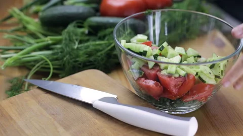 Stirring vegetables in a transparent dish Video stock 94477269
