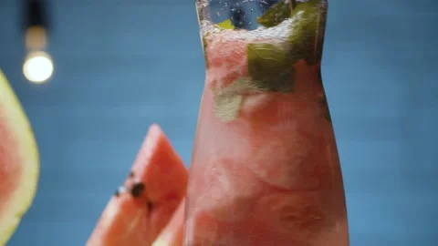 Stirring watermelon lemonade Stock Footage 142885490