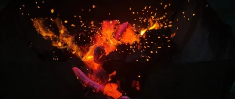 Stirring Wood Fire Stock Footage 125535060