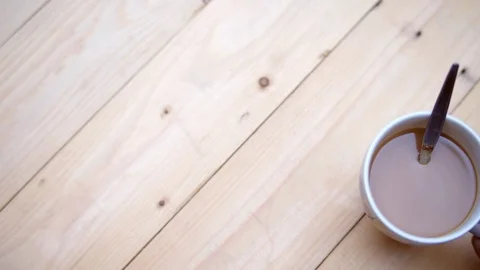 Stirs with Spoon in Cup of Coffee, video 4K Stock Footage 91068671