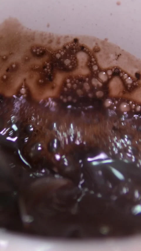 Stirs Sugar in Cup of Aromatic Coffee Closeup. Person Hand Stirring Cup Hot Video stock 305981252