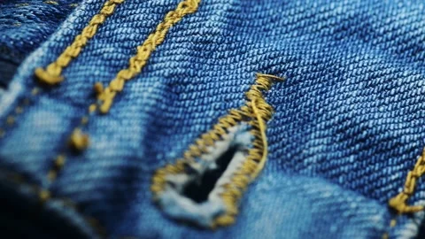 Stitch of blue jeans Stock Footage 166903800