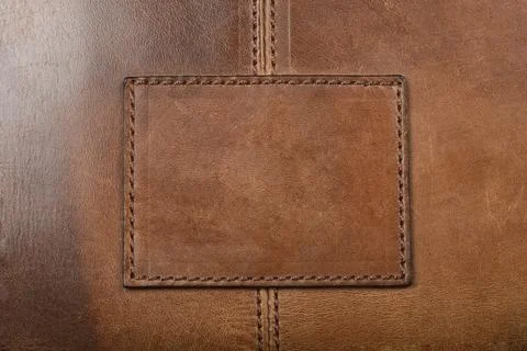 Stitched brown leather square patch Stock Photos