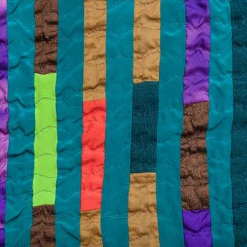 Stitched patchwork headscarf from narrow strips Stock Photos