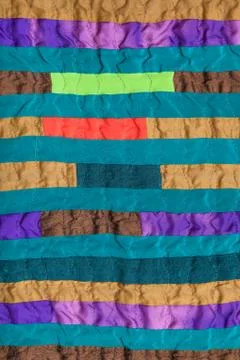 Stitched patchwork scarf from many narrow bands Fotos de archivo