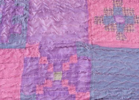 Stitched pieces of silk fabric in patchwork scarf Stock Photos