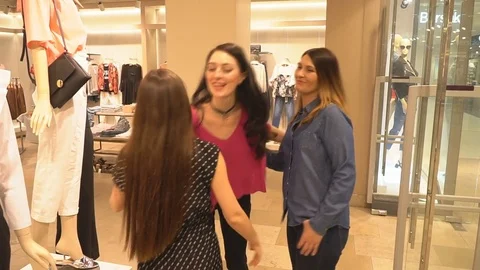 Stlist Greets Customers in the Store Stock Footage 74659909