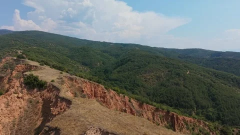Stob Pyramids Geological Rock Formations and Green Hills, Bulgaria Stock Footage 343365077