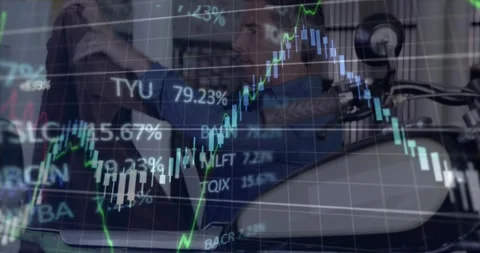 Stock chart overlay appearing mechanic inspecting and adjusting bike showing Stock Footage 333829888