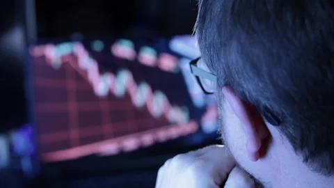 Stock declining - over shoulder Stock Footage 326265568