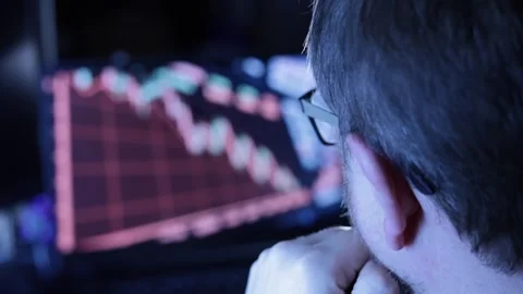 Stock declining - over shoulder - slow Stock Footage 326265554