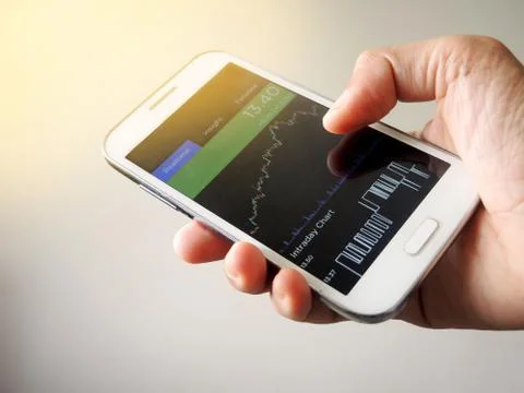 Stock exchange chart graph on smartphone Stock Photos