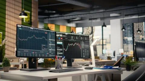 Stock exchange insights displayed on computer screens in hedge fund office Stock Photos