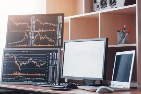 Stock exchange trader's workplace with computers Stock Photos