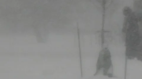 Stock Footage 1080p - Snow/Winter students brave storm Stock Footage