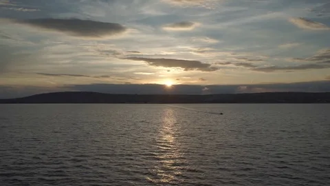 Stock Footage Beautiful clouds sunset reflecting in the water Stock Footage