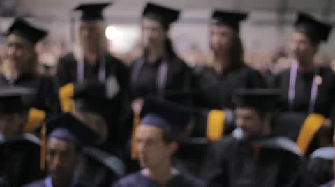 Stock Footage - College Graduates Pose for Photo - Blurred Stock Footage