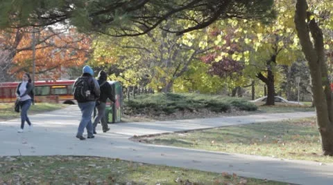 Stock Footage College Students in Fall - Walking, bus, bicycle Stock Footage