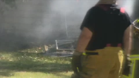 Stock Footage - Emergency Scene - Intense fire - close up of firefighters Stock Footage