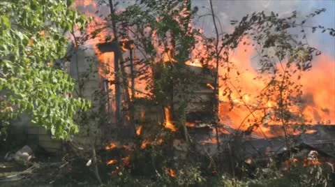 Stock Footage - Emergency Scene - Intense fire - Total loss - pan Stock Footage