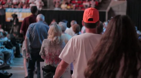 Stock Footage - Voters poor into Iowa Straw Poll floor Stock Footage
