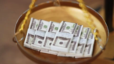 Stock image featuring scales and money Stock Footage 321940045