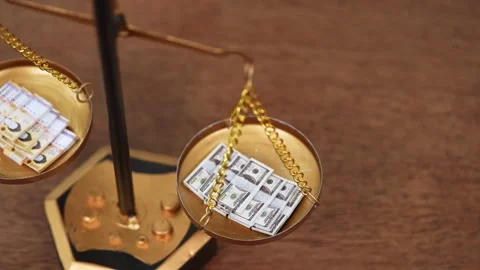 Stock image featuring scales and money Stock Footage 321946081