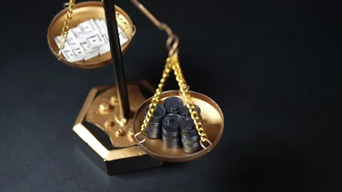 Stock image featuring scales and money Stock Footage 321954819