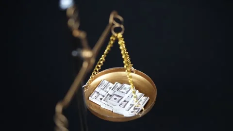 Stock image featuring scales and money Stock Footage 321965627