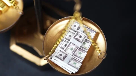 Stock image featuring scales and money Stock Footage 321974061