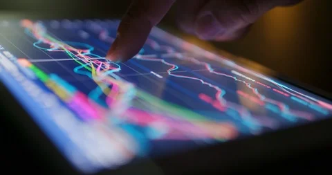 Stock market analysis on tablet computer Stock Footage 96013794