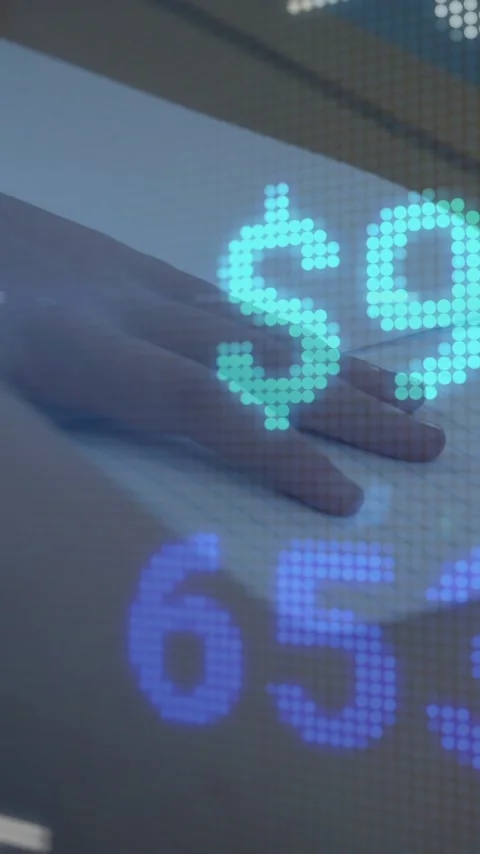 Stock market data animation over person writing in notebook Stock Footage 323340420