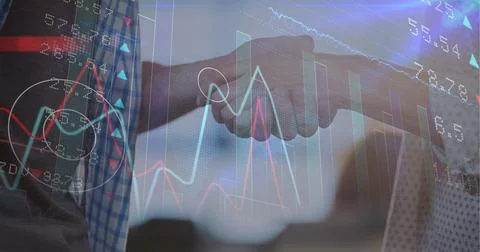 Stock market data processing against mid section of man and woman shaking hands 스톡 사진