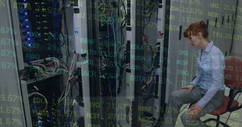 Stock market data processing over caucasian female engineer working at computer Stock Footage 326185307