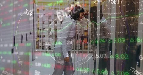 Stock market data processing over stressed caucasian female engineer at server Stock Photos