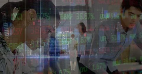 Stock market data processing over diverse male and female engineers working at Foto stock