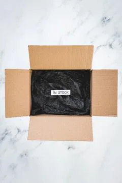 In stock text inside of delivery parcel from online shopping, shopping and re Foto stock