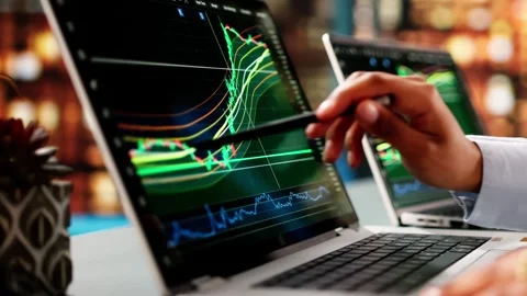 Stock Trader Woman Using Multiple Computers Stock Footage 304713731