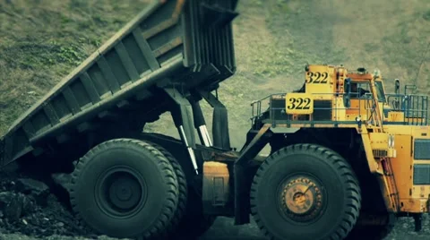 Stock Video Footage Mining Dump Truck dumper unloads Stock Footage 8558232