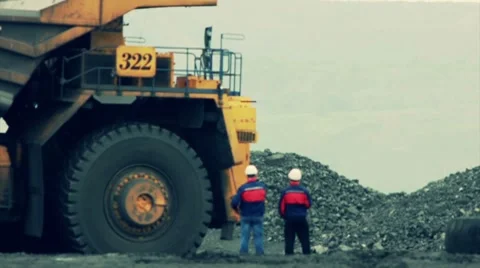 Stock Video Footage Mining Dump Truck loading excavator heavy track Video stock 8558257