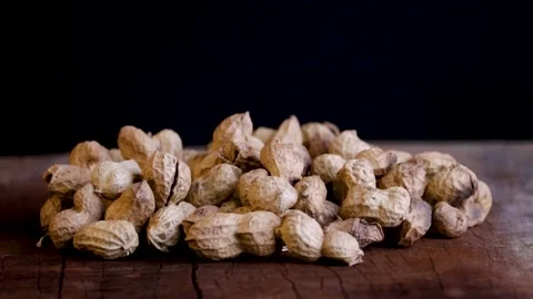 A stock video of Groundnuts in black background Stock Footage 212789665
