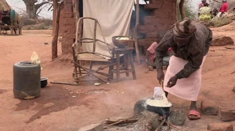 Kenya: Cooking Over an Open Fire Stock Footage 8660053