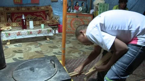 Mongolia: Making a Fire in the Stove Stock Footage 8955035