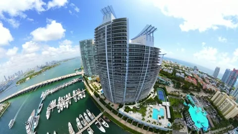 Stock video tiny planet Miami Beach 5th Street highrise buildings and marina Stock Footage 339637627